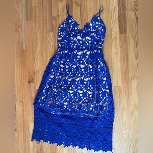 Blue lace dress with nude dress underneath